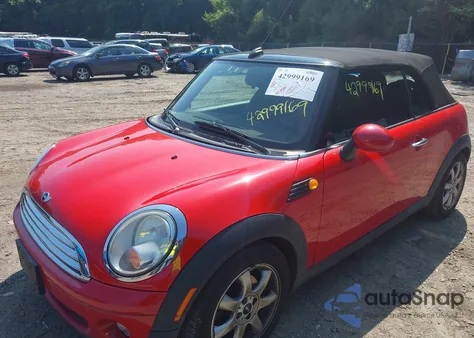 2009 Mini Cooper z USA, uszkodzony, nr VIN WMWMR33599TU95758